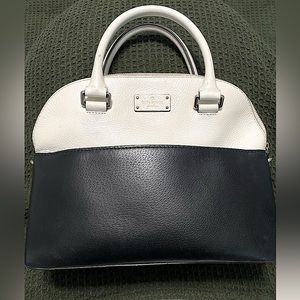 Kate spade black and white color block hand bag. Shoulder strap not included.